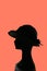 Mannequin head silhouette wearing elegant vintage hat, coral background