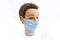 Mannequin head with a surgical mask on a white background