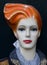 Mannequin with red lips and orange hair