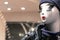 Mannequin in the store with red lips, white skin and long eyelashes