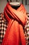 Mannequin wearing red scarf
