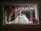 Mannequin in a wedding dress, at night in a shop window dressed