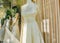 Mannequin in window display. Showcase mannequin wedding dress