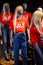 Mannequins in a window of a clothing store in T-Shirts With Signs Advertising Sale