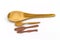 Manny wooden spoon on white background.