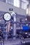 Manometer in nuclear laboratory, industrial blue toned