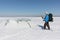 Manon ski looking at the ice breaking on the river