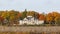 Manor house with trees in autumn colors