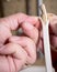 Mans hands working with electrical wire