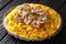 Mansaf a feast dish of lamb in yogurt sauce atop flatbread and a bed of rice, is known as the national dish of Jordan closeup in