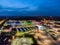 Mansfield Sutton in Ashfield Modern NHS Kings Mill hospital building lit up bright colourful night exterior aerial view drone