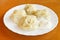 Manti dumpling on white plate