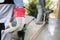 Manual construction worker driving wheel barrow