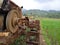 A manual tractor made of steel for plowing rice fields used to prepare land for rice cultivation.