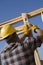 Manual Worker Hammering Nail At Site