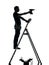 Manual worker man on stepladder drilling silhouette
