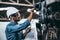 Manual workers cooperating while measuring a electronic