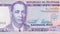 Manuel A Roxas on 100 piso Philippines money bill close up fragment