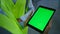 Manufacture workers holding tablet greenscreen collect production data closeup
