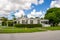 Manufactured homes with landscaped hedges and lawn