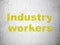 Manufacuring concept: Industry Workers on wall background