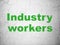 Manufacuring concept: Industry Workers on wall background