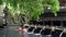 MANUKAYA, INDONESIA- MARCH,22, 2018: wide view of two women and an elephant statue at holy spring fountain, bali