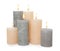 Many alight wax candles on white