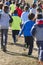 Many athletic children running on a sunny day. Outdoor circuit