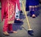 many barefoot women sweep the road during the ceremony