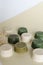 Many bars of ecofriendly colored soaps in light background.