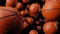 Many basketball balls on black background.