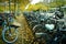 Many bicycles parking everywhere at the main station in GÃ¶ttingen, Germany