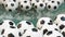Many Black and White Soccer Balls Background. Football Balls Swimming in a Pure Water