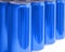 Many blank metal blue cans on table, closeup.