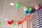 Many bright balloons under ceiling close-up