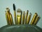 Many brown and gold makeup brushes