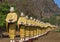 Many buddha statues standing in row at Tai Ta Ya monastery temple in Myanmar Burma