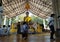 Many buddhist come to pay respect buddha statue in Phra That Bang Phuan temple in Nong Khai province of Thailand.