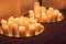 Many burning candles - Light of candels in the church