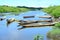 many canoes on the amazon river