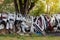 Many car bumpers near rural trees