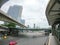 Many car, bus and motorcycle at Intersection at Silom Road, Rama IV Road and Ratchadamri road with Thai-Japanese Friendship Bridge