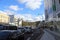 Many cars with traffic jam on the road with building, mountain range and blue sky at Nara city, Japan