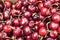 Many cherries for sale on a Farmers market