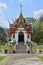 Many chicken statues in the temple have a backdrop of sky and beautiful natural clouds