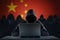 Many chinese hackers in troll farm. Privacy and security concept.