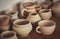 Many clay pot is on the table in pottery.