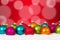 Many colorful Christmas balls background decoration with snow