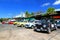 Many colorful classic Mini Austin Cooper parking on the street